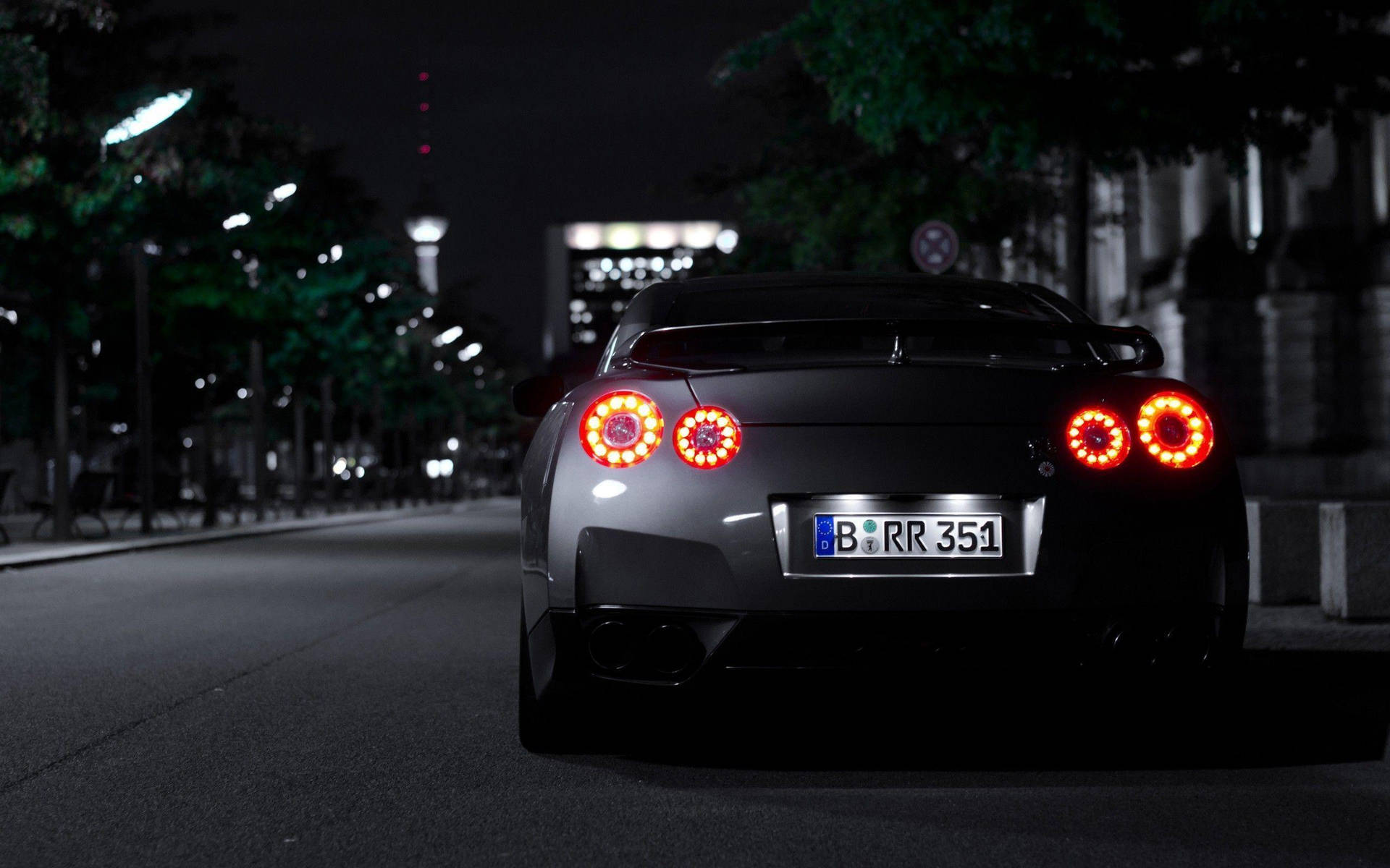 Back View Of A Silver Nissan Gtr