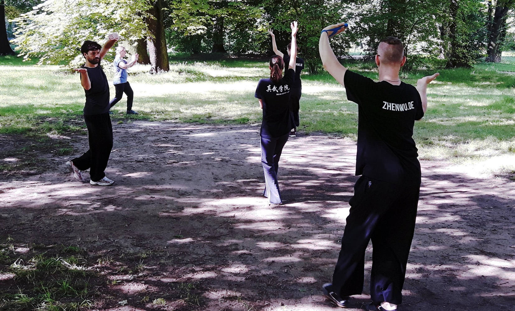 Bagua Practitioners Outdoors In Nature Background