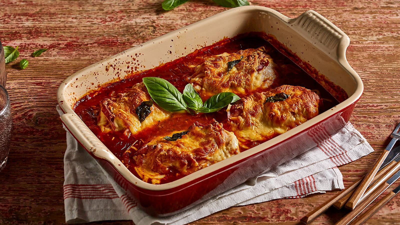 Baked Chicken Parmigiana In Red Sauce Background