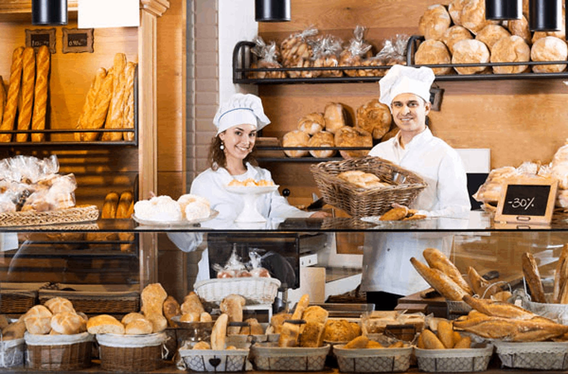 Bakers In Bakery Background