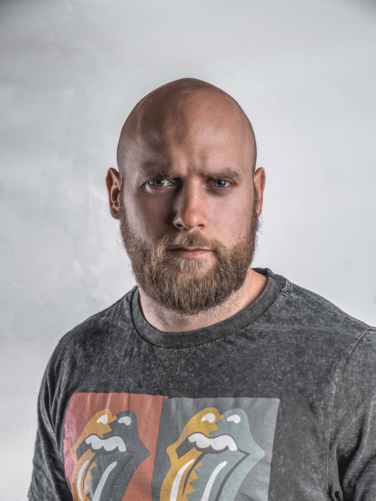 Bald Man Intense Gaze Background