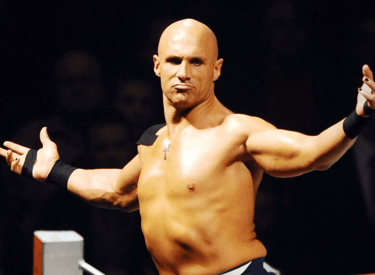 Bald Wrestler Gesturingin Ring