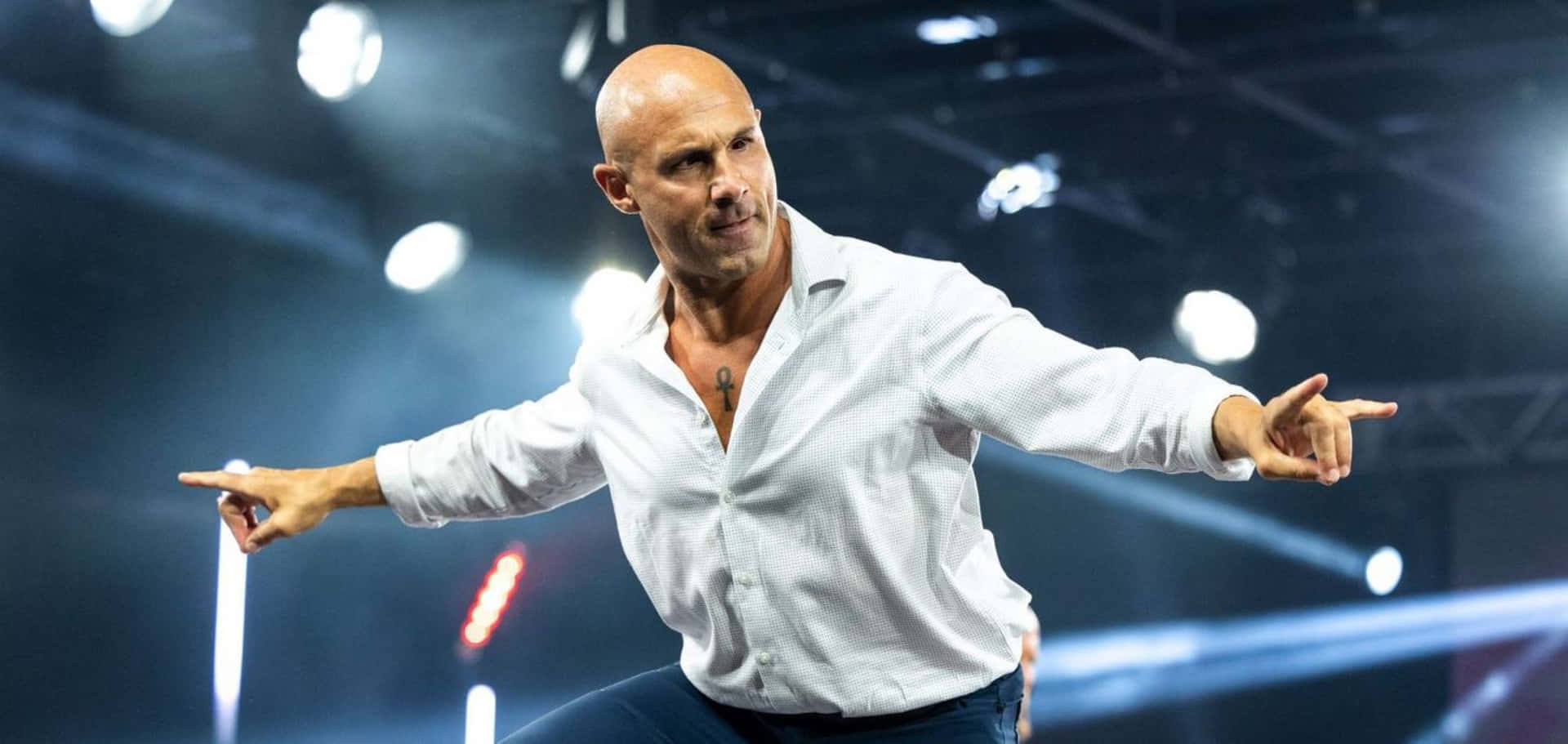 Bald Wrestler Pointingin Ring.jpg Background