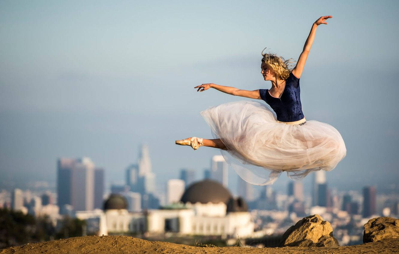 Ballet Dancer Jump Pose Background