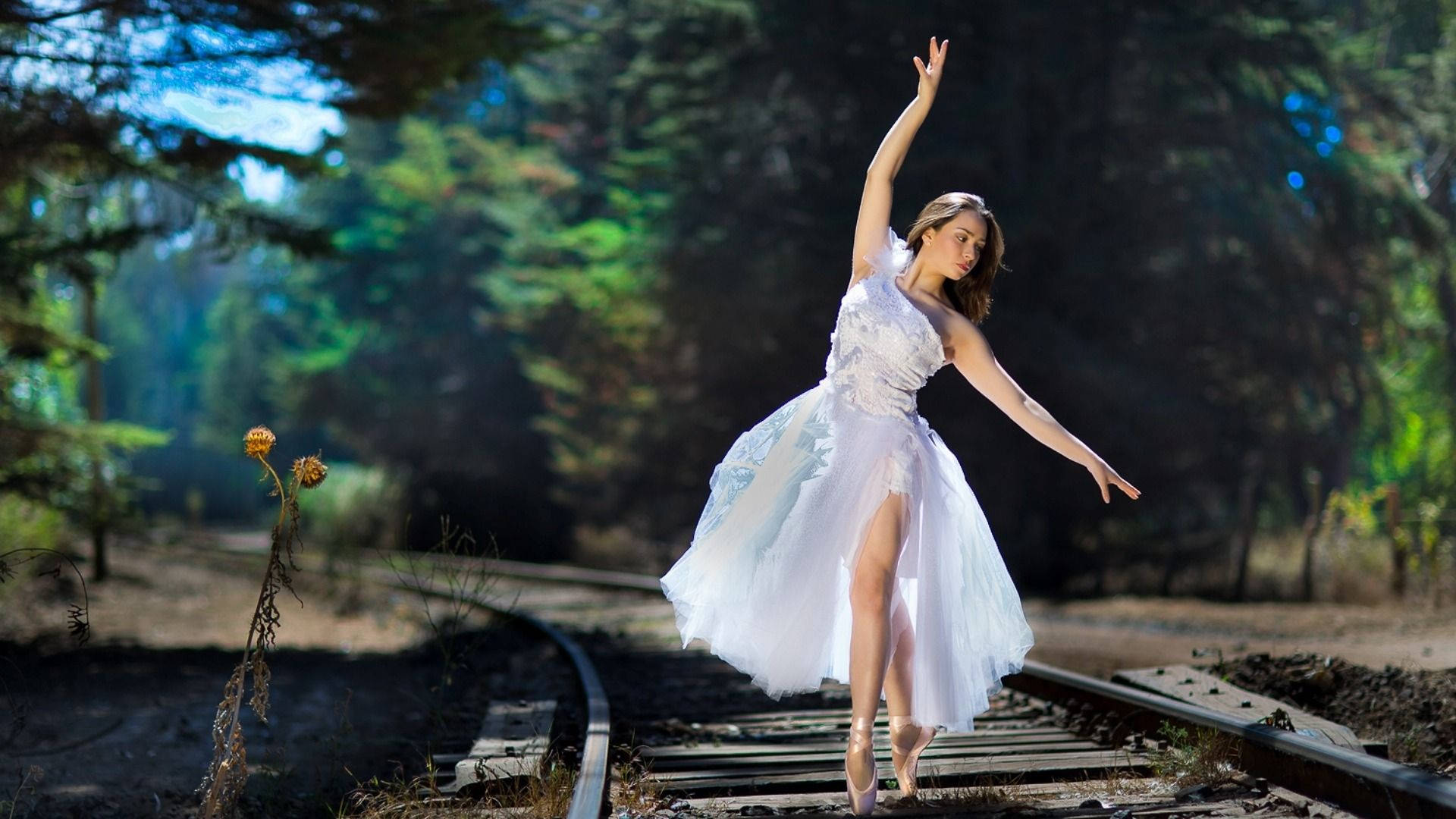 Ballet Dancer On Train Track Background