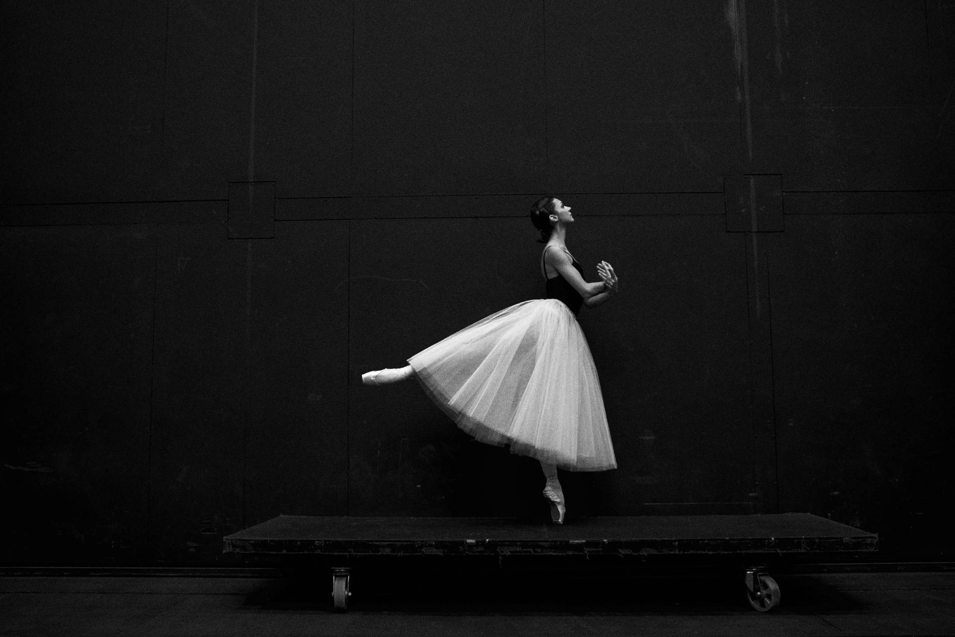 Ballet Dancer On Trolley Background