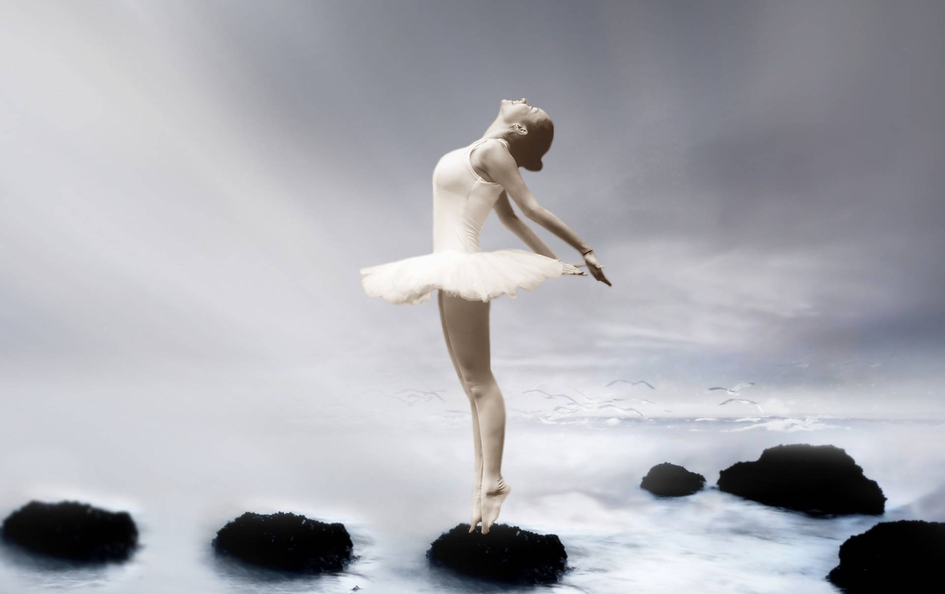 Ballet Dancer Standing On Rock Background