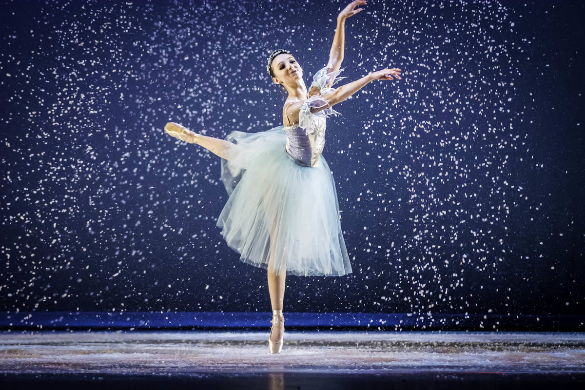 Ballet Dancer With White Confetti Background