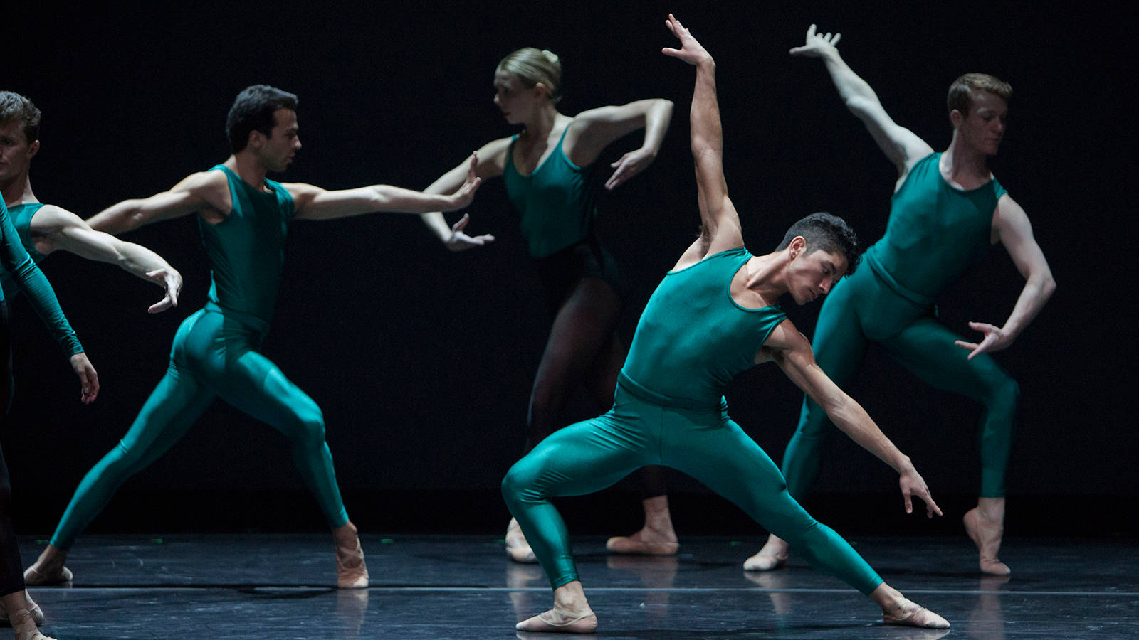 Ballet Dancers In Leotards Dance Pose Background