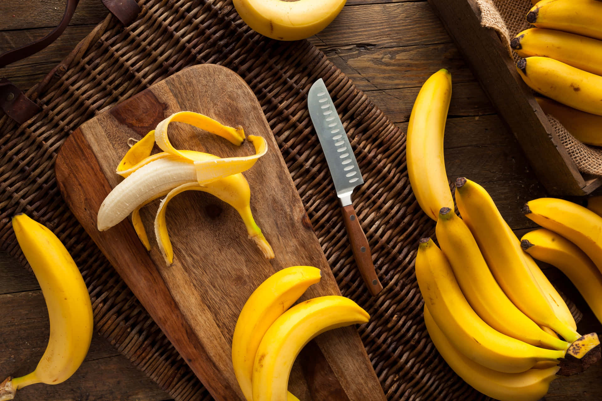 Bananas And Cutting Board Background