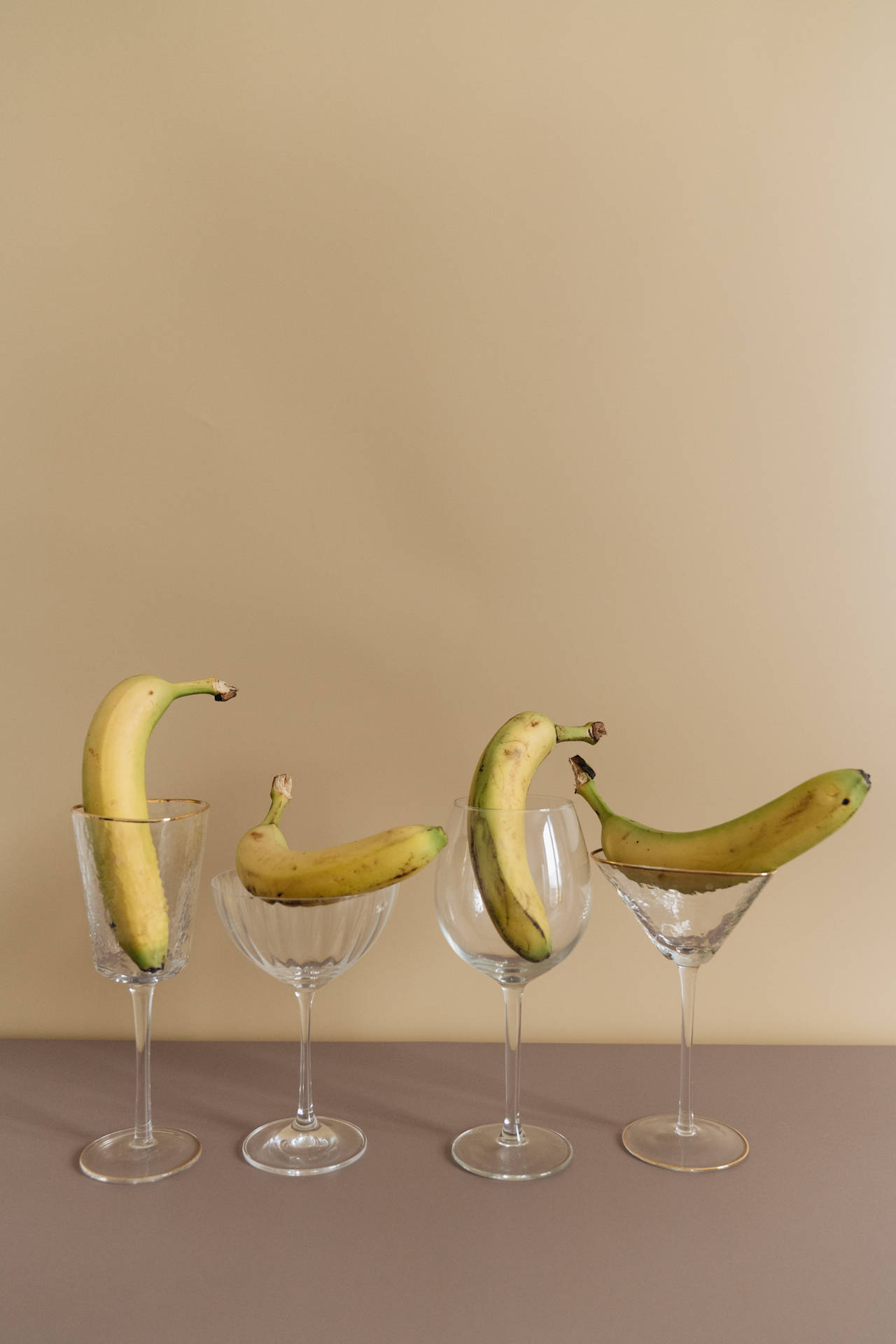 Bananas In Wine Glasses Background