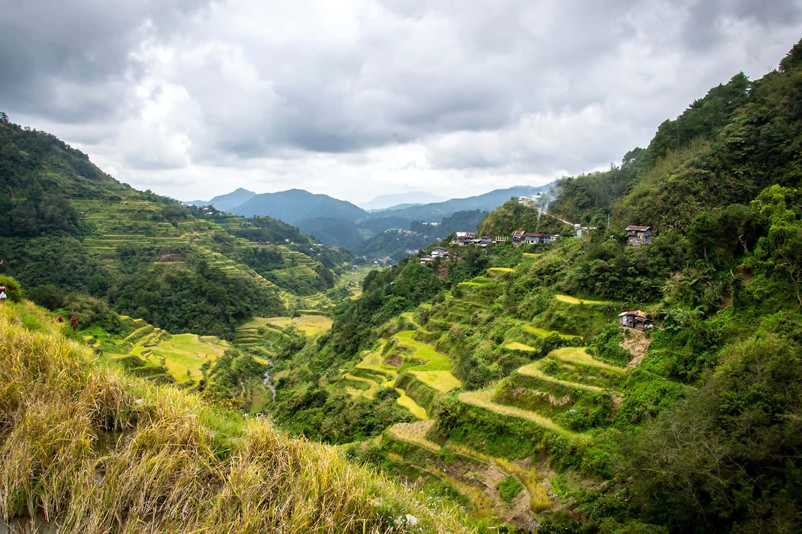 Banaue Rice Terraces In The Philippines During Cloudy Day Background