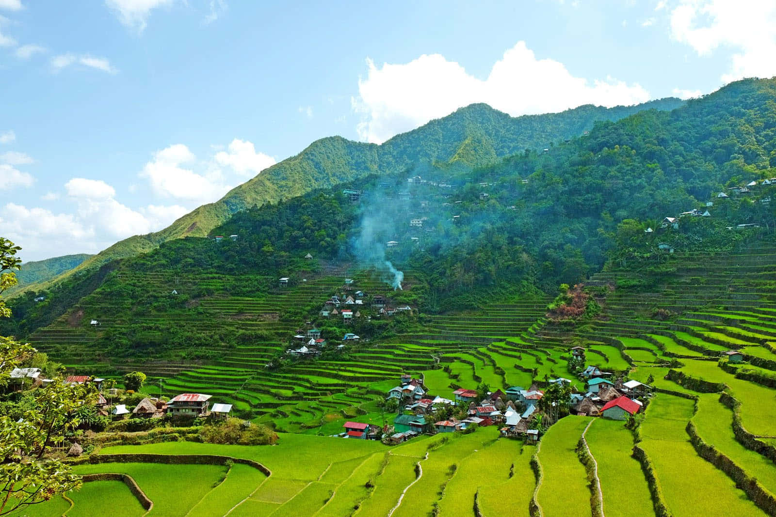 Banaue Rice Terraces In The Philippines With Smoke