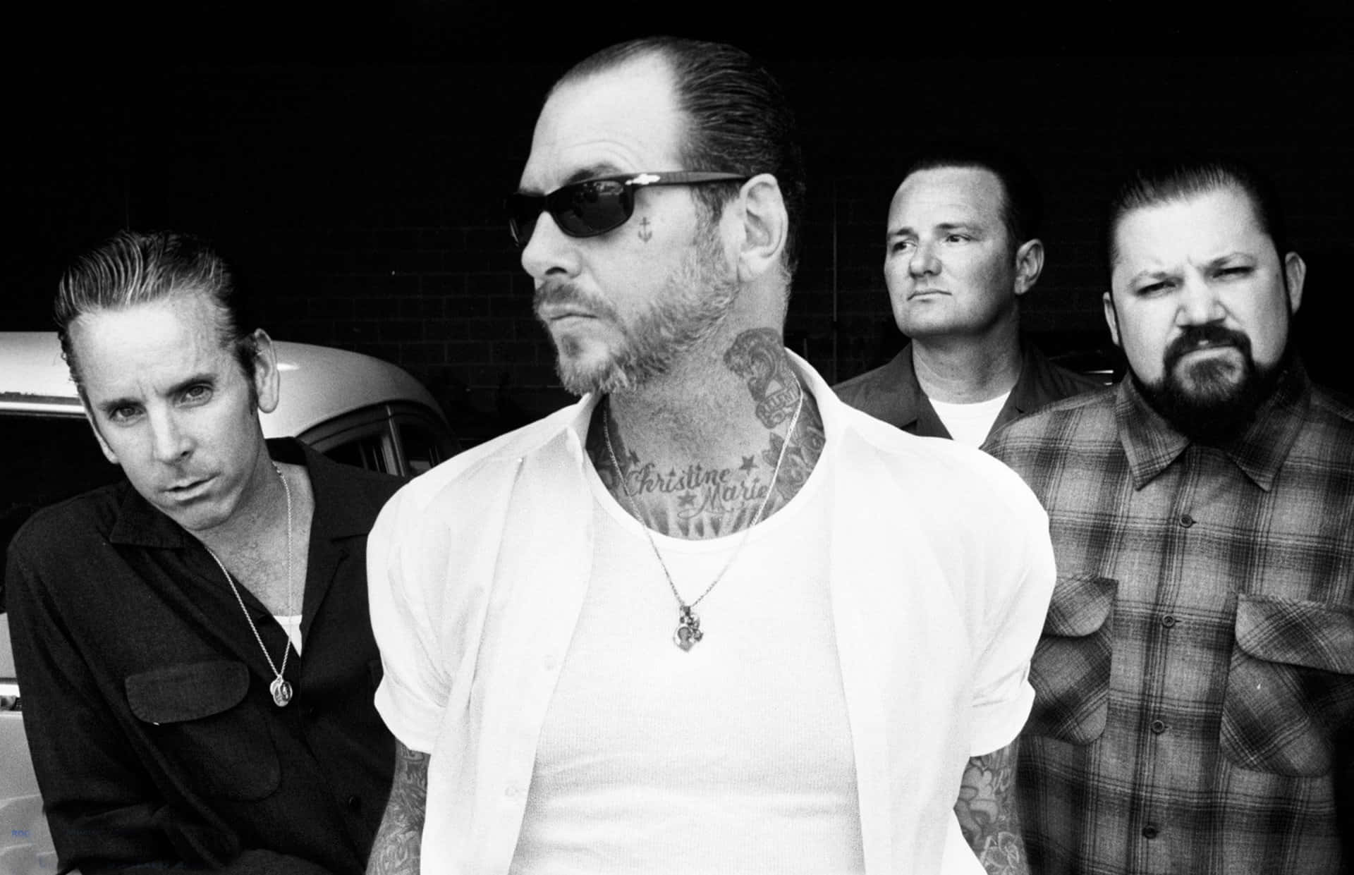 Band Members Social Distortion In Black And White Background