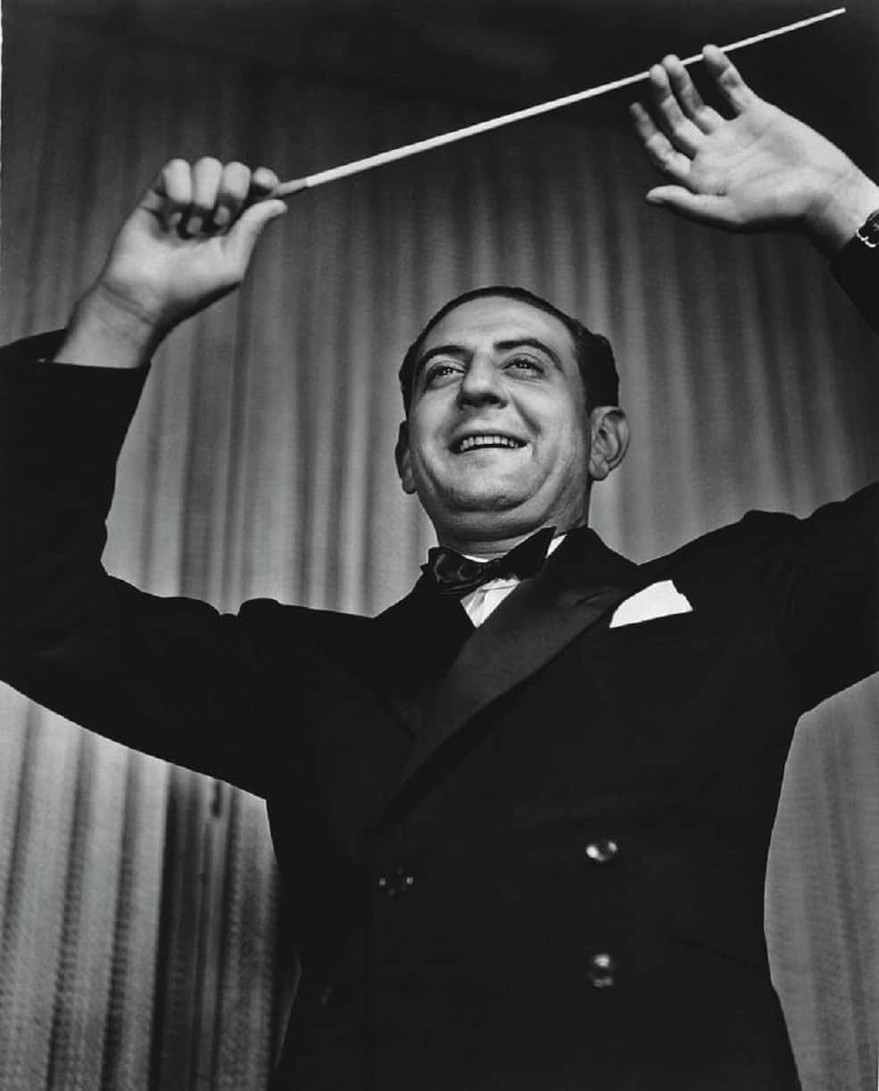 Bandleader Guy Lombardo Conducting Background