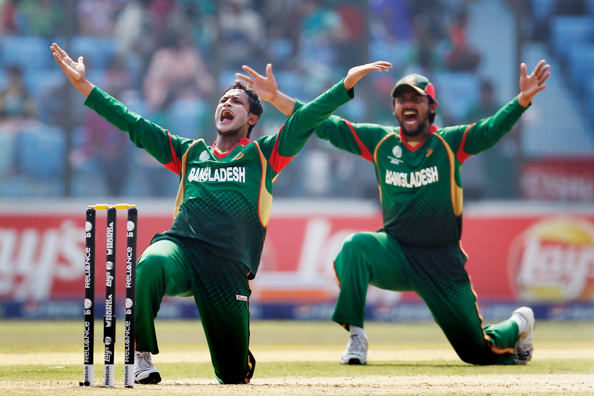 Bangladesh Cricket Players Kneeling Background