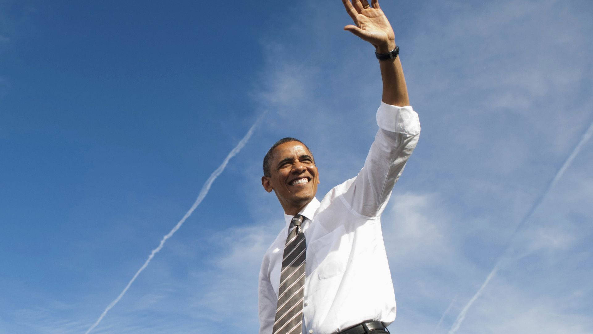 Barack Obama Under The Blue Sky Background