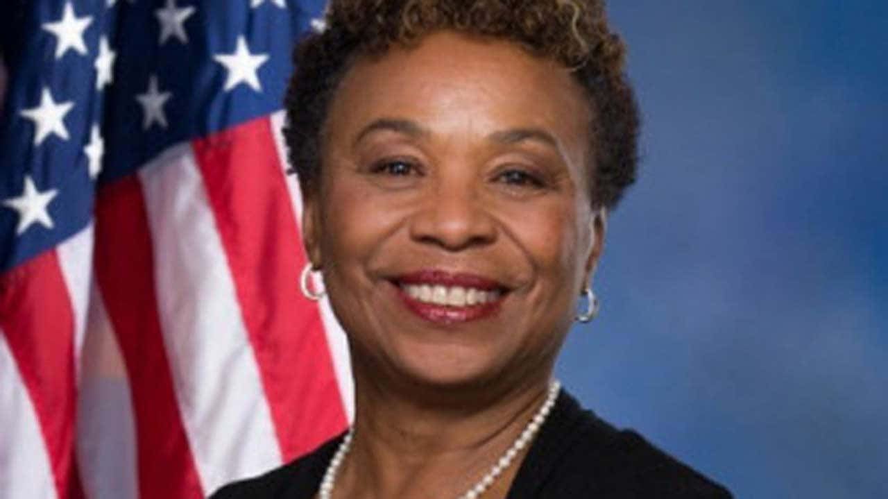 Barbara Lee And American Flag Background