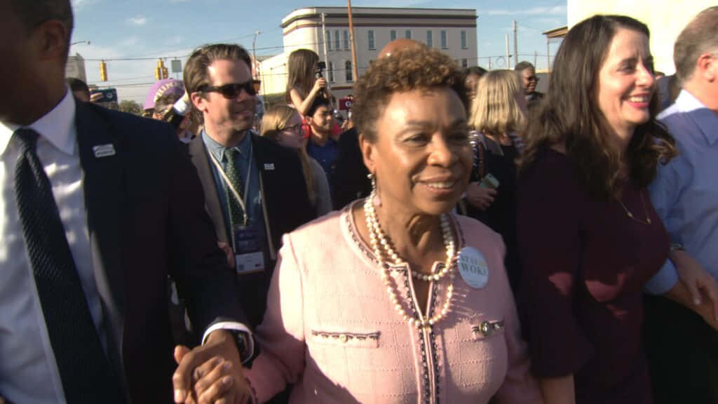 Barbara Lee Holding Hands With People Background