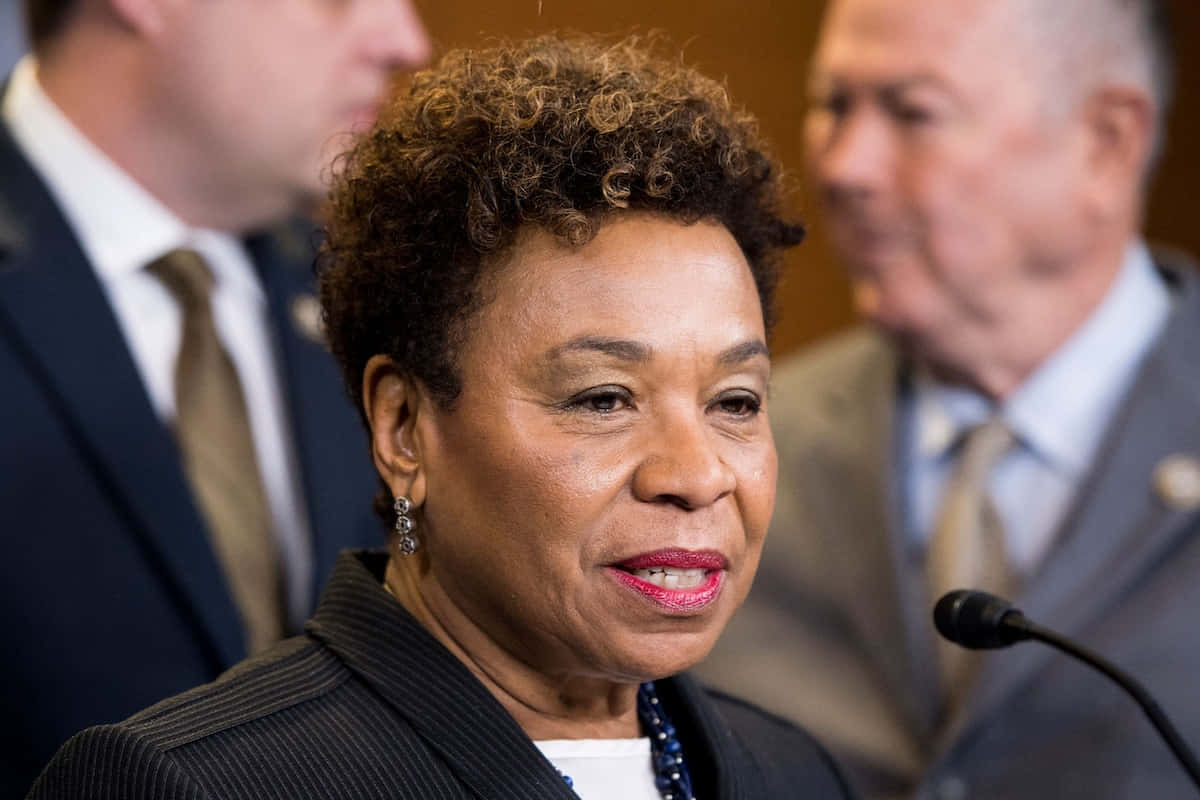 Barbara Lee Speaking From Podium Background