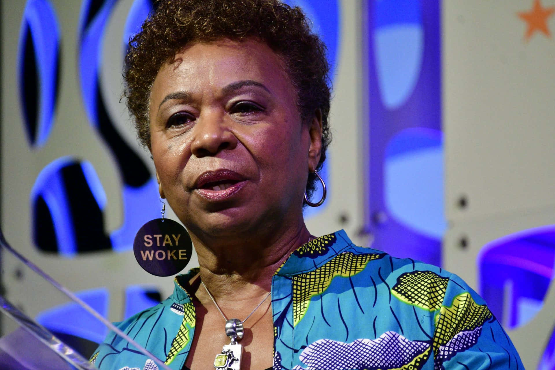 Barbara Lee Wearing Colorful Outfit Background