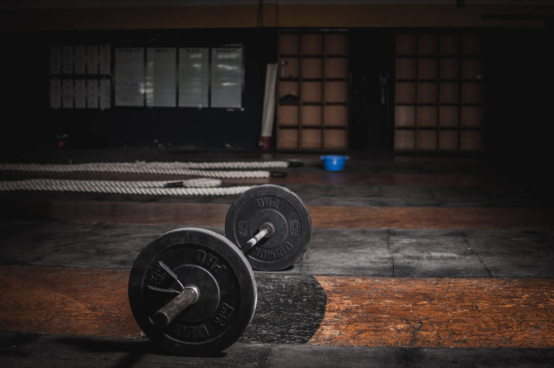 Barbell On Old Cement Floor Background