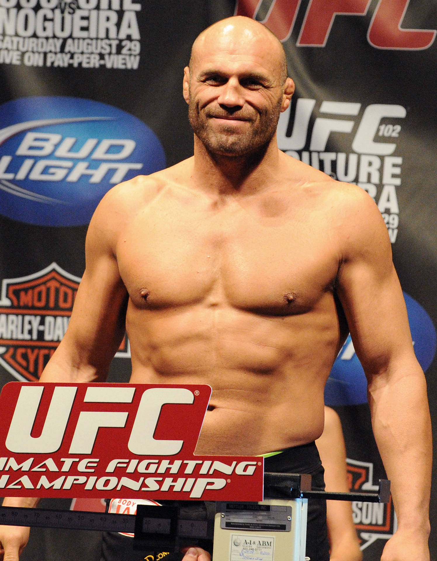 Bare-chested Randy Couture Background