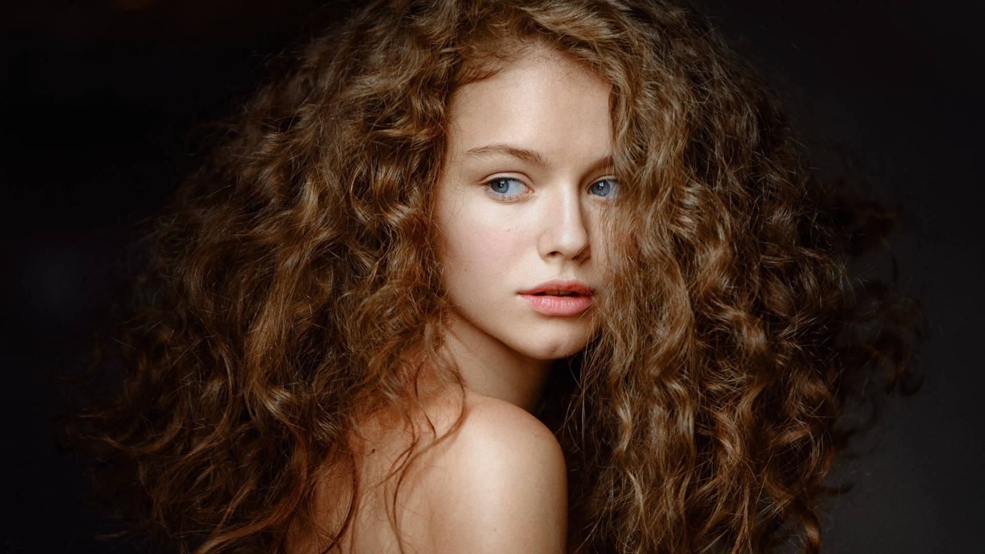 Bare-faced Woman With Curly Hair Background