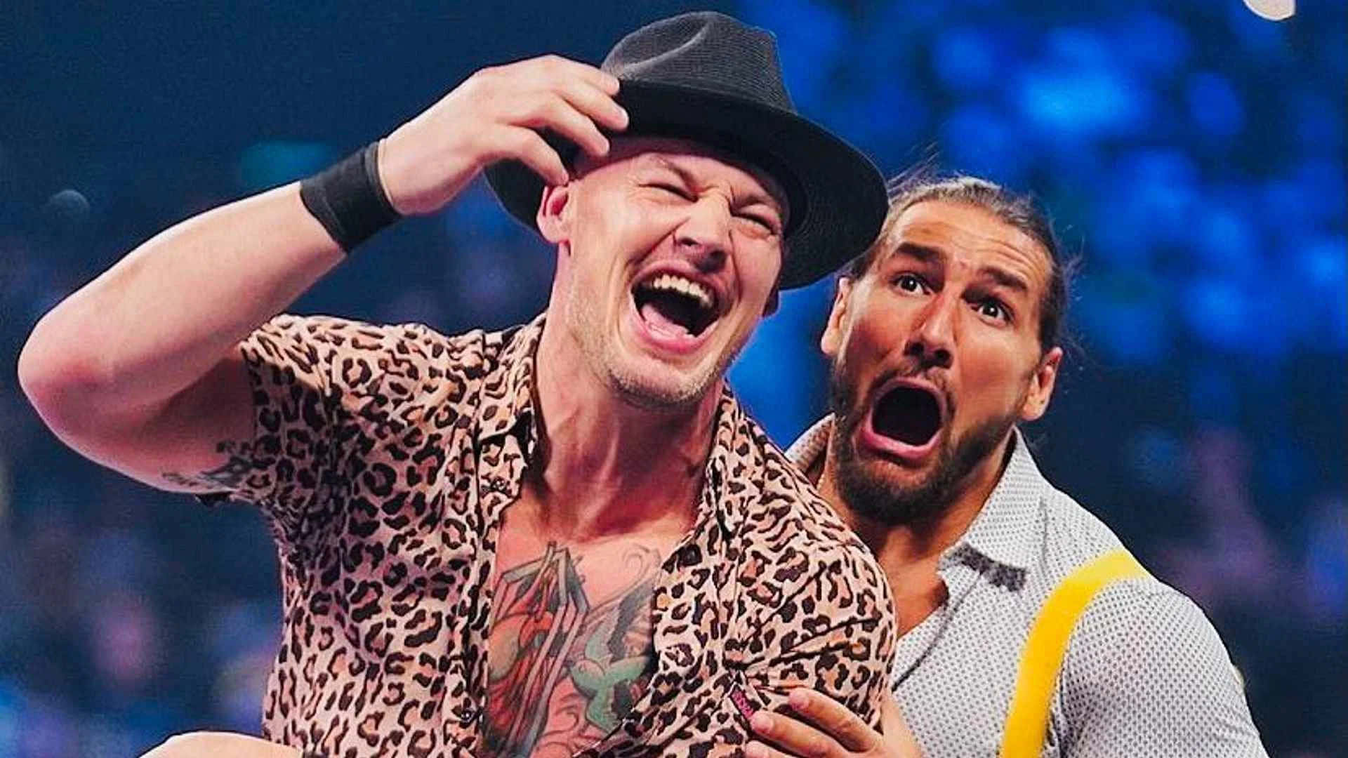 Baron Corbin And Madcap Moss Background