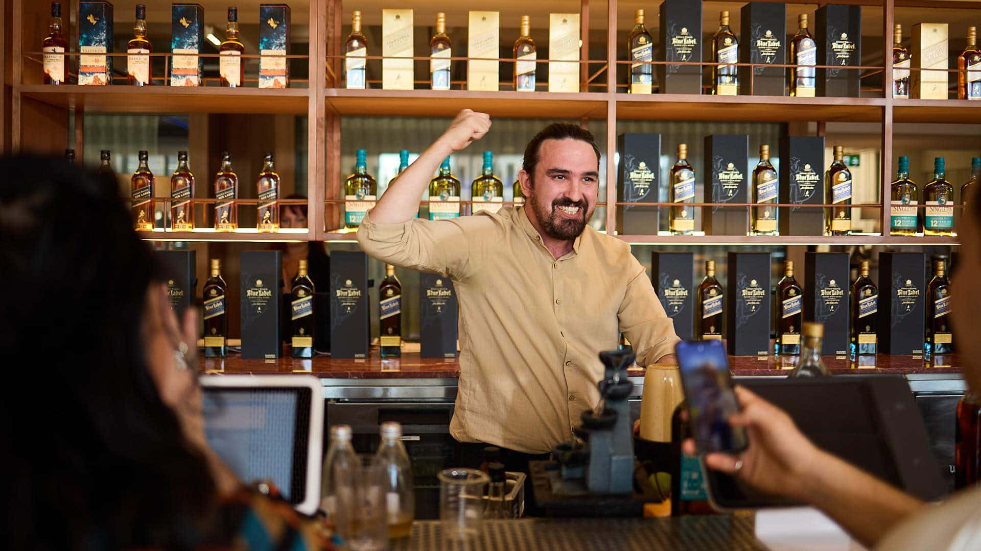 Bartender Enjoying Work Moment.jpg Background