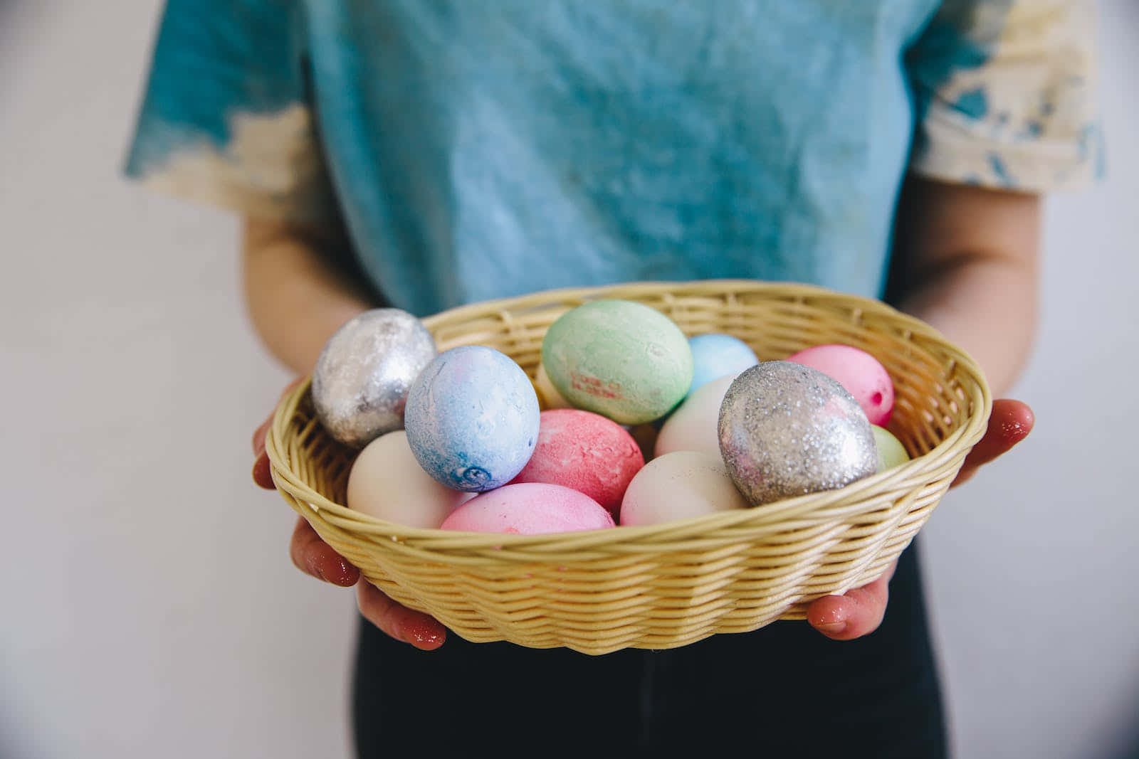 Basket Of Pastel Easter Eggs Background