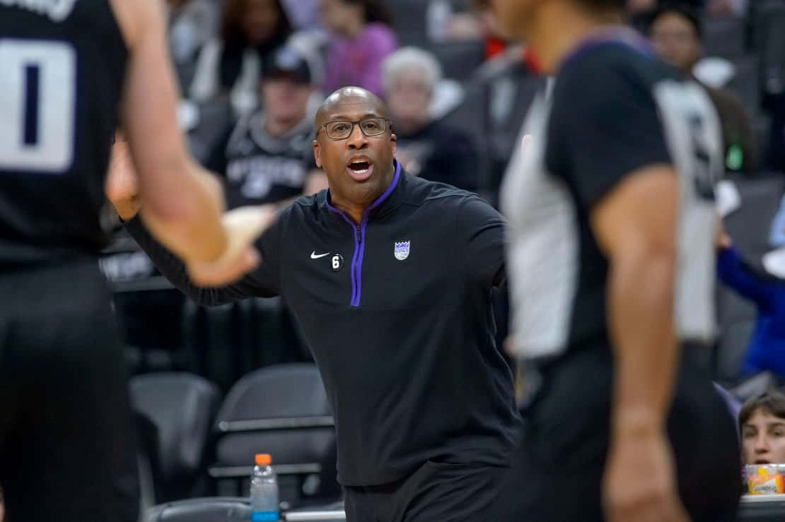 Basketball Coach Mike Brown Gesturing During Game Background