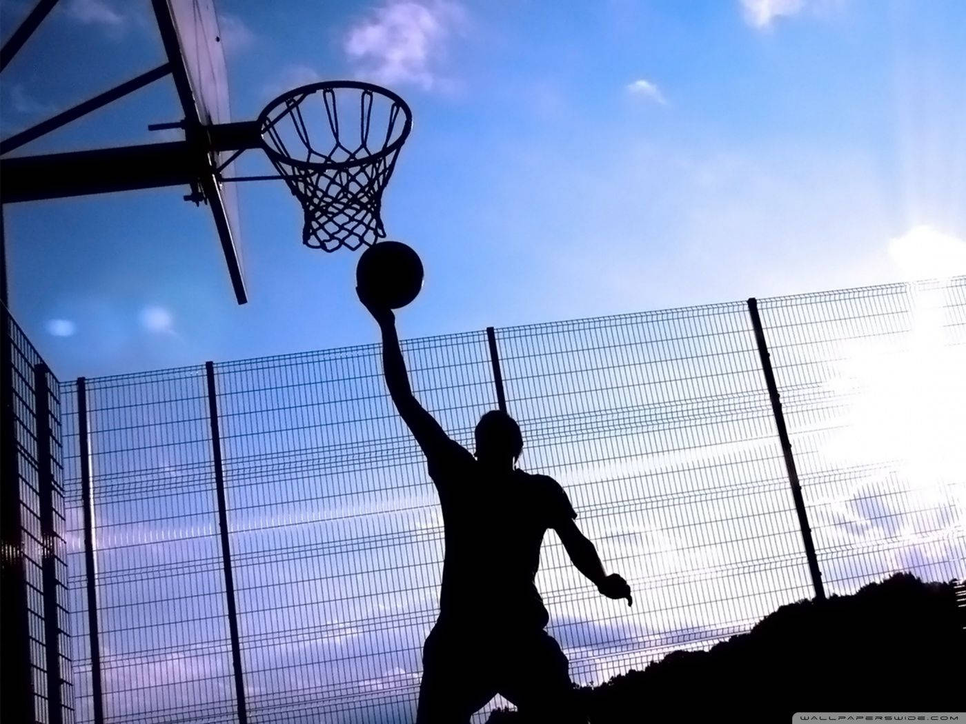 Basketball Dunk Silhouette Blue Sky Background