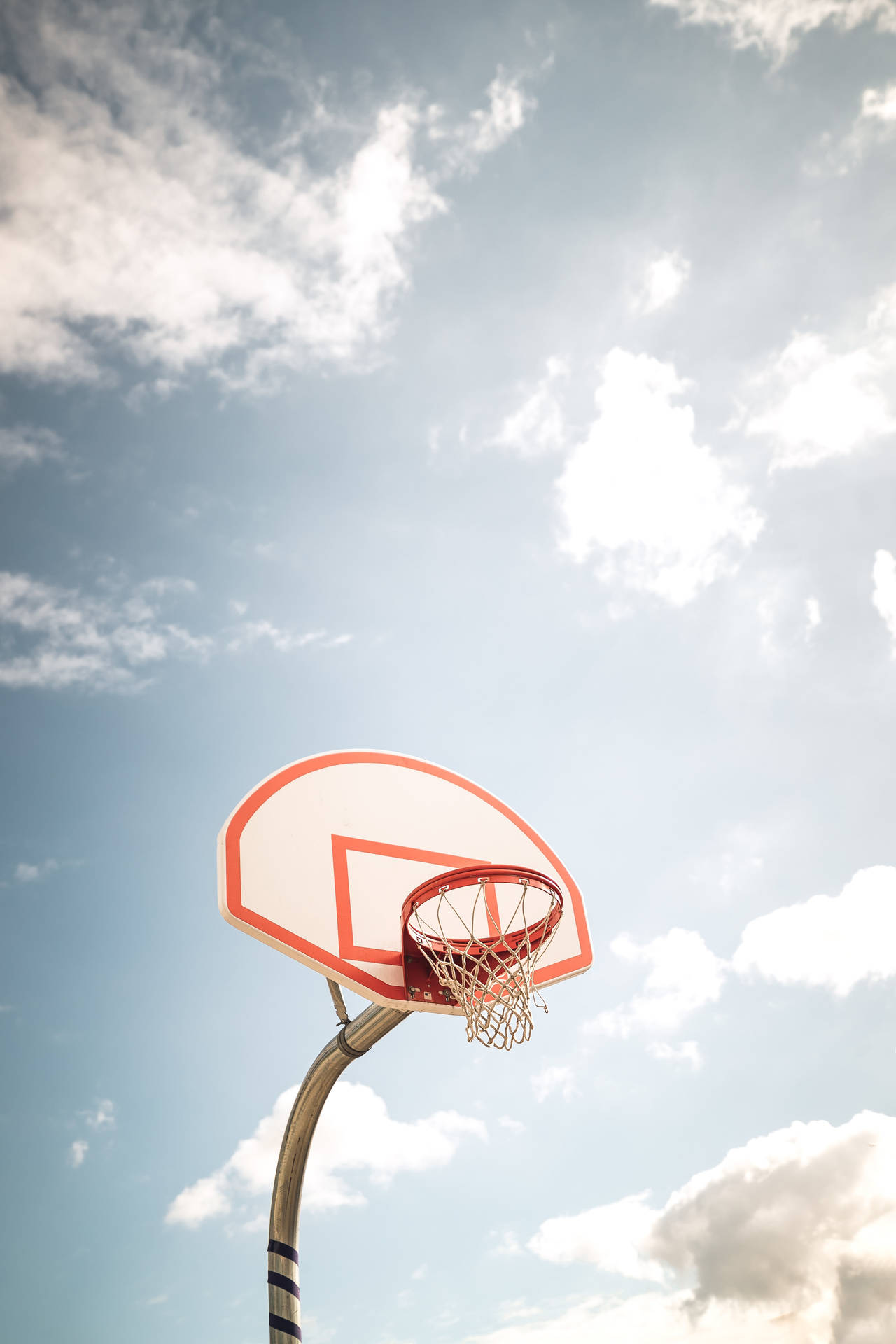 Basketball Hoop Sunny Sky Background