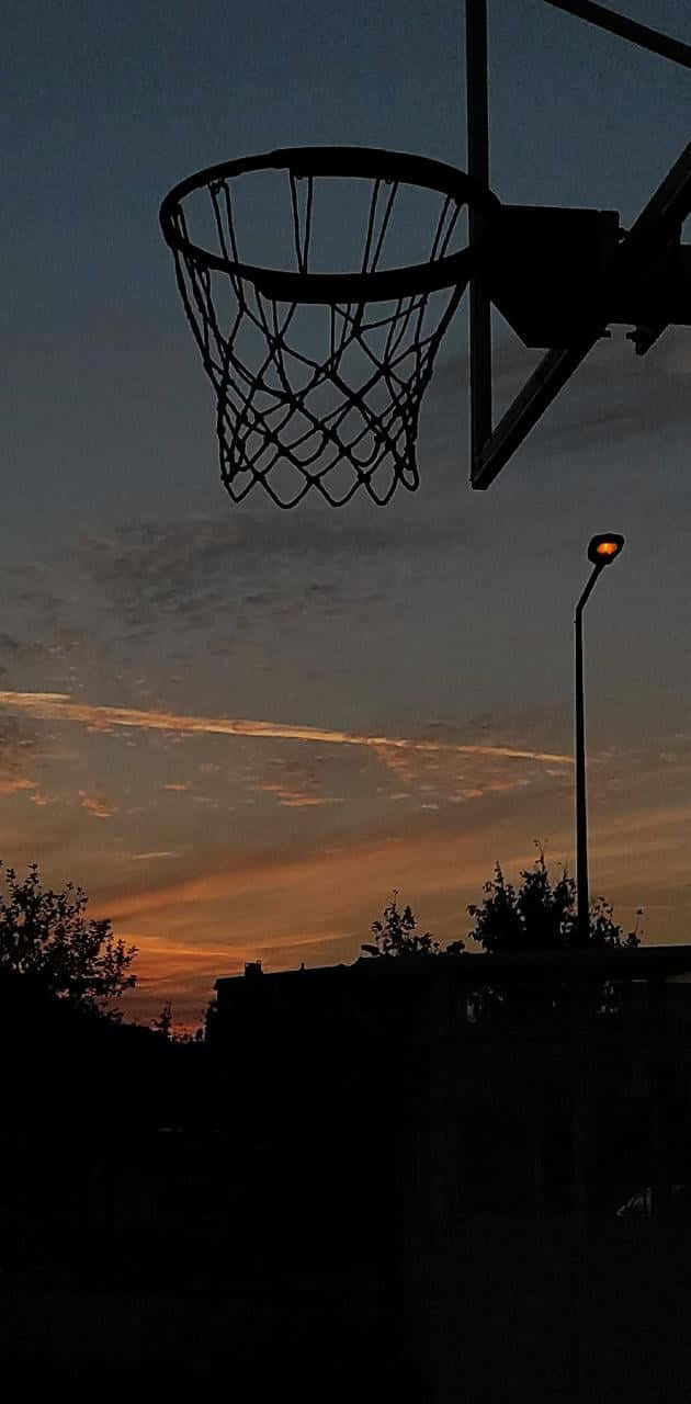 Basketball Hoop Sunset Silhouette Background