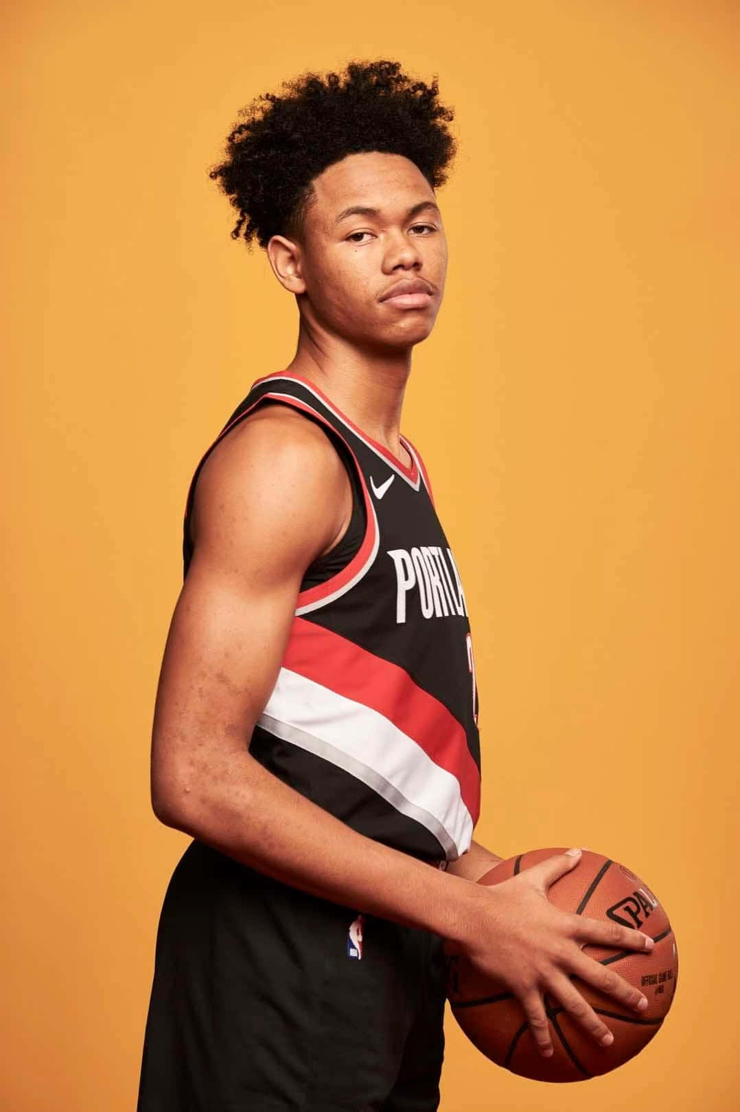 Basketball_ Player_ Portrait_ Orange_ Background.jpg