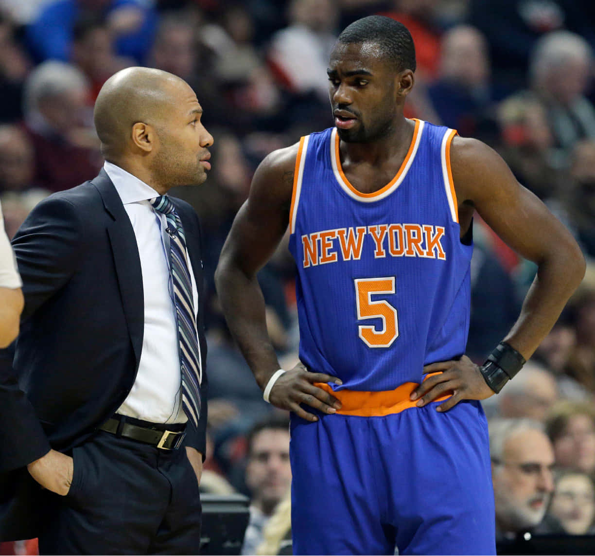 Basketball Player Tim Hardaway Jr. Coach Derek Fisher Background