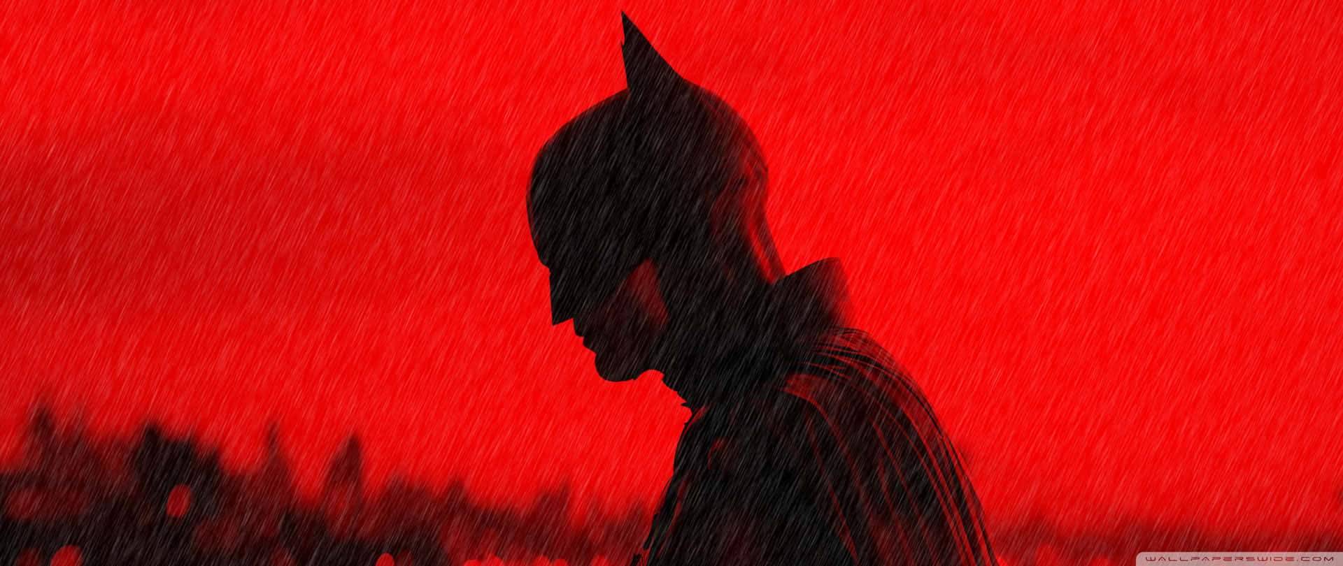 Batman In The Rain With Red Background Background