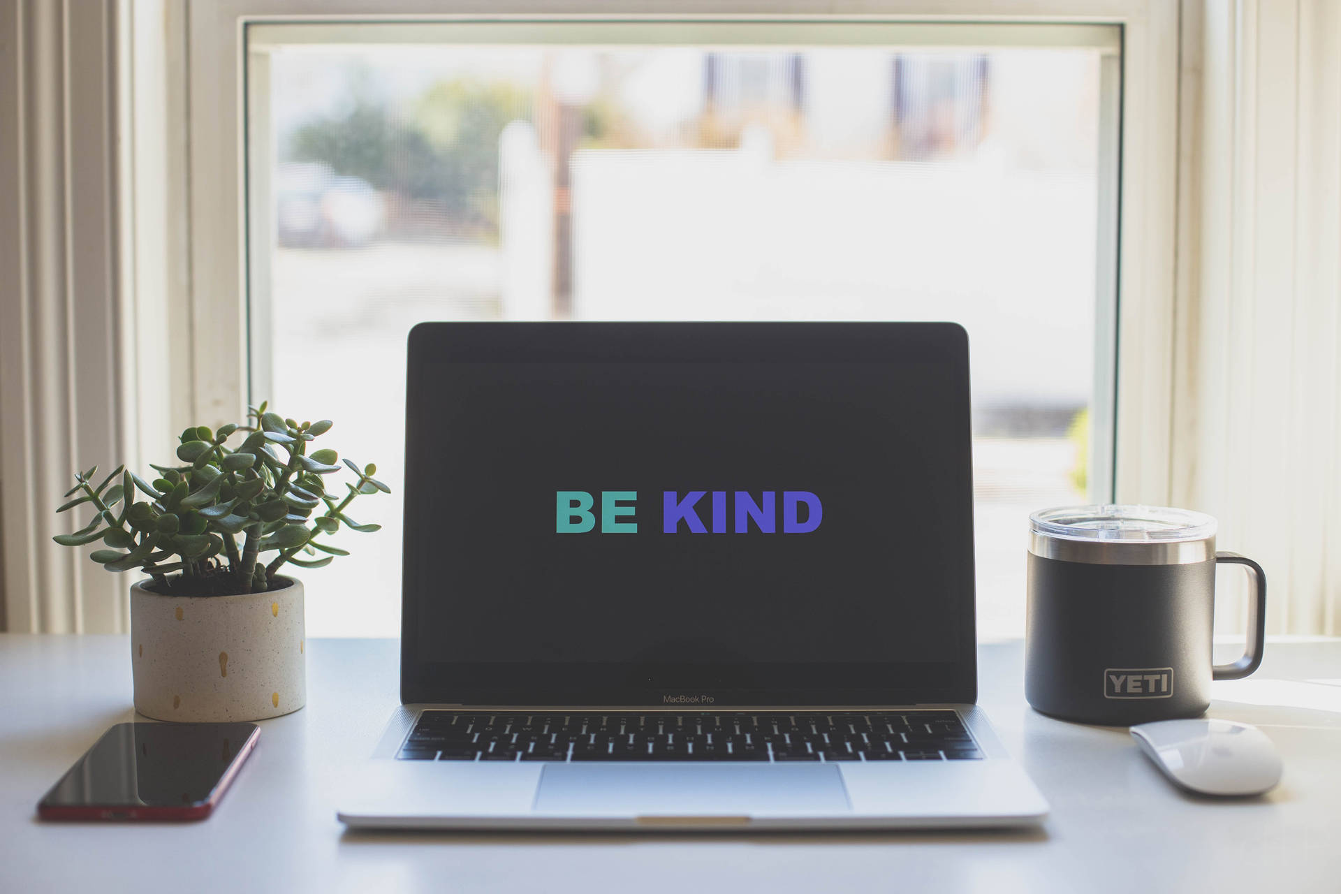 Be Kind Motivational Quote On Screen Background
