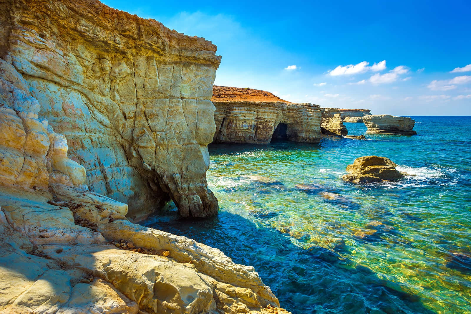 Beach In Paphos With Gigantic Stones Background