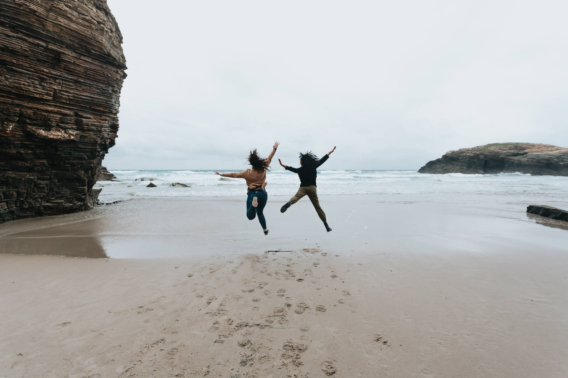 Beach Jumping Together Background