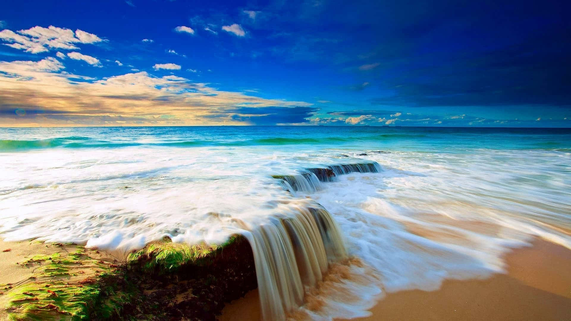 Beach Scene Waterfall Blue Skies Background