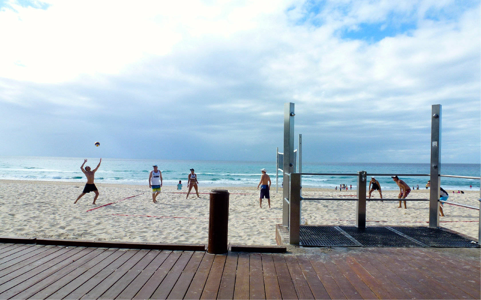 Beach Volleyball Near Wooden Deck Background