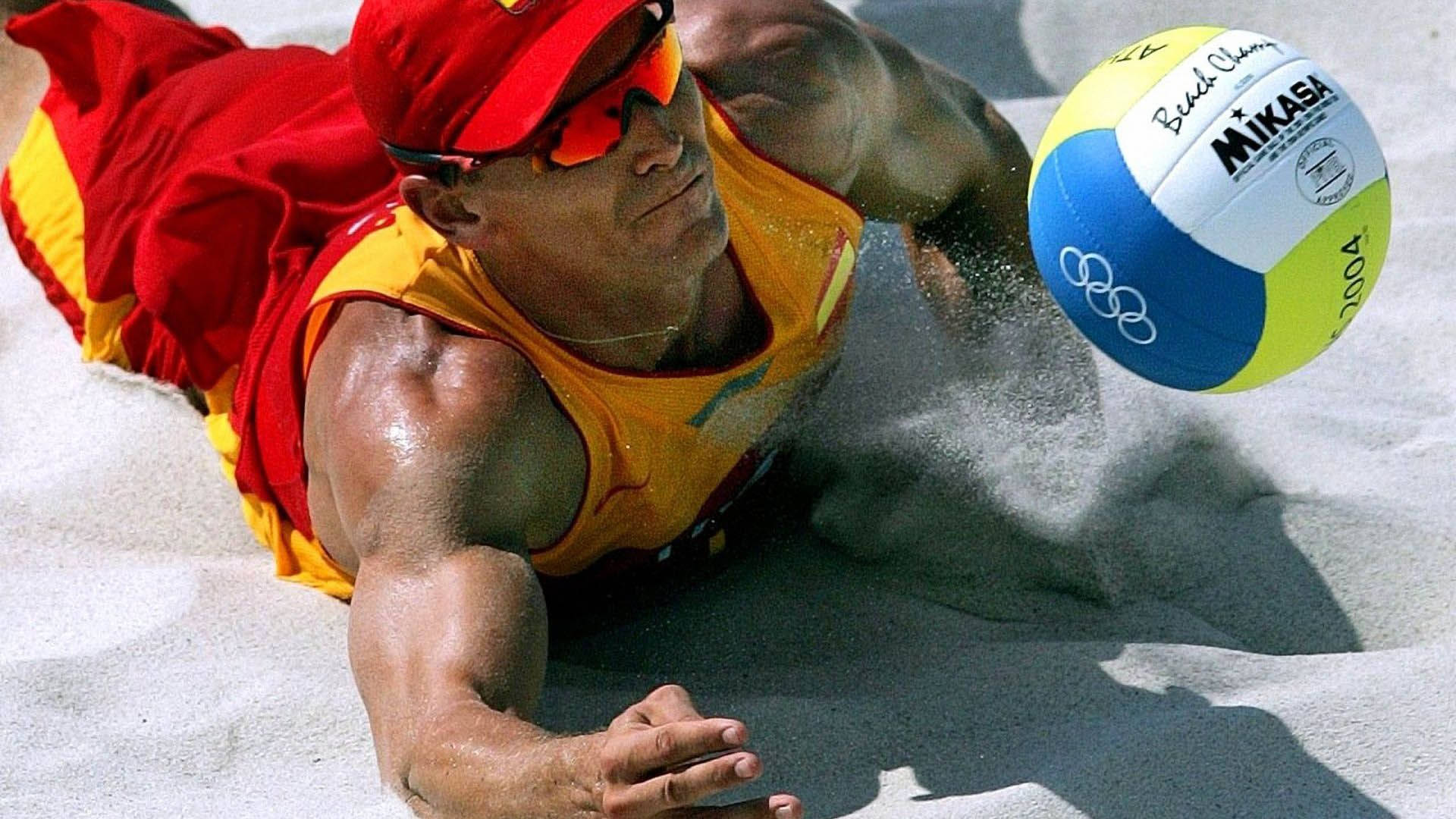 Beach Volleyball Player Javier Bosma Digging A Ball