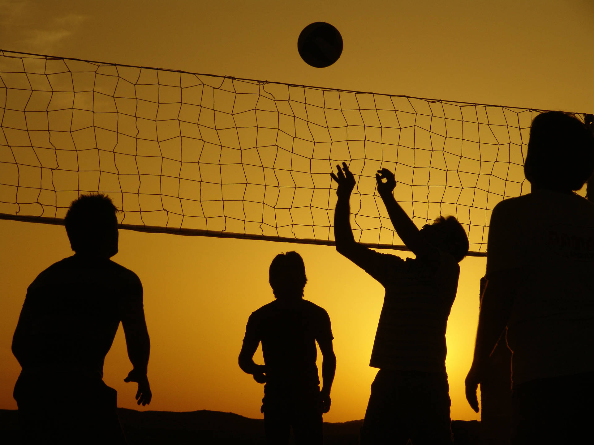 Beach Volleyball Silhouette Of Players Background