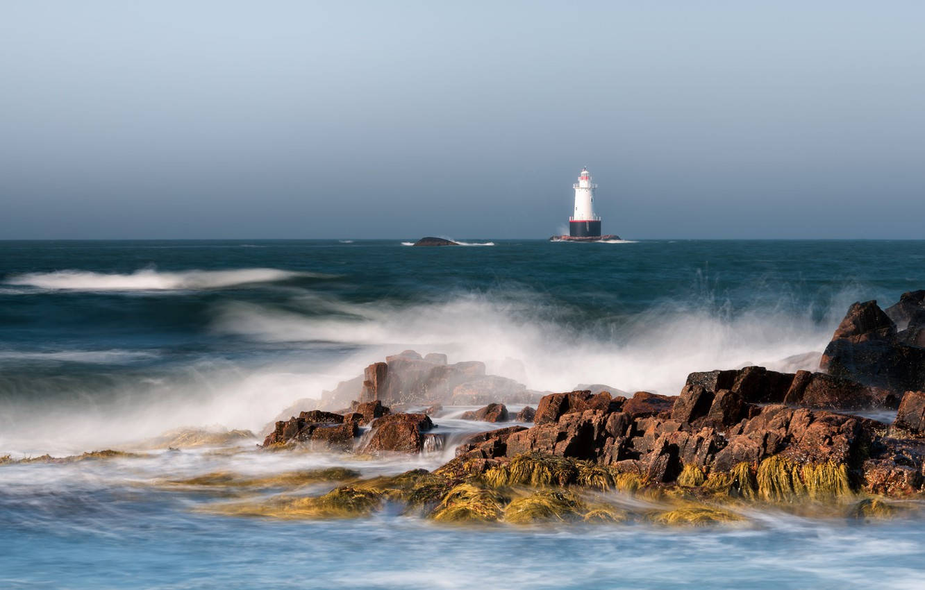 Beach Waves Against The Rocks In Rhode Island