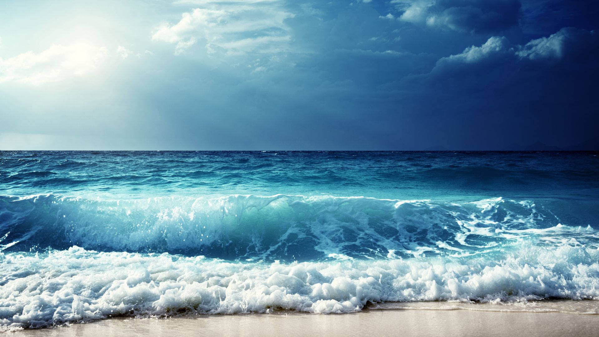 Beach Waves And Pale Blue Sky Horizon Background