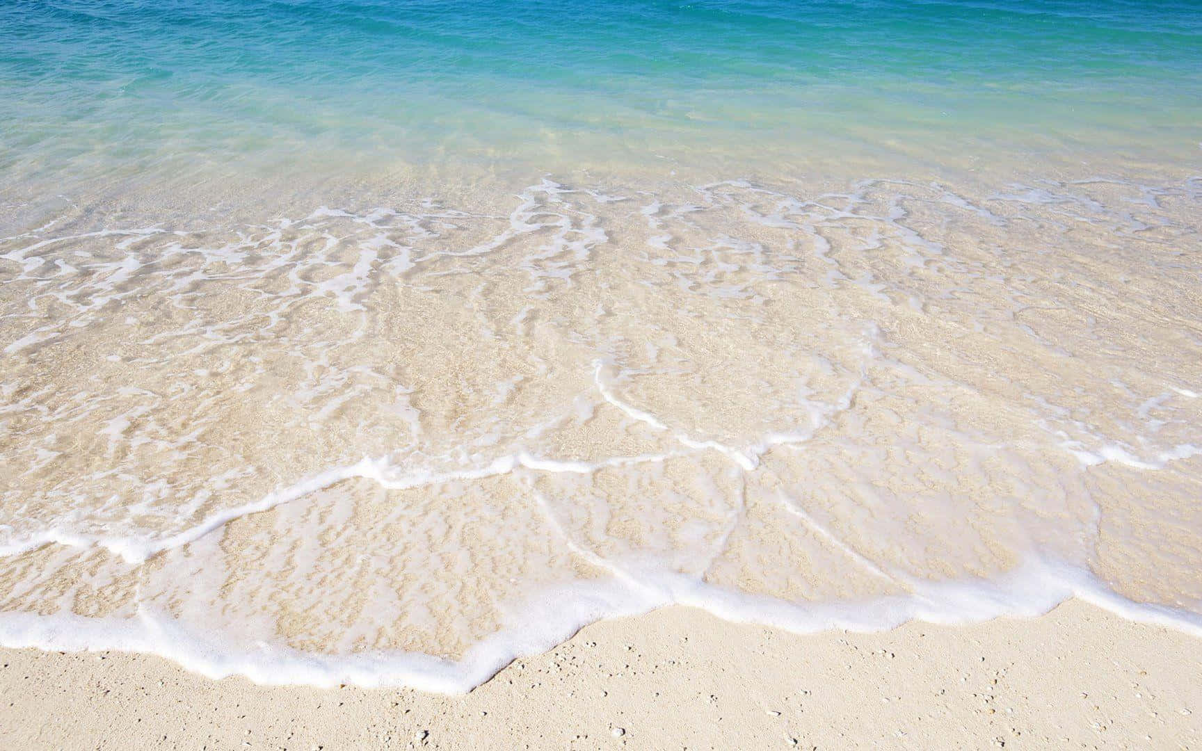 Beach Waves Hitting Sand Background