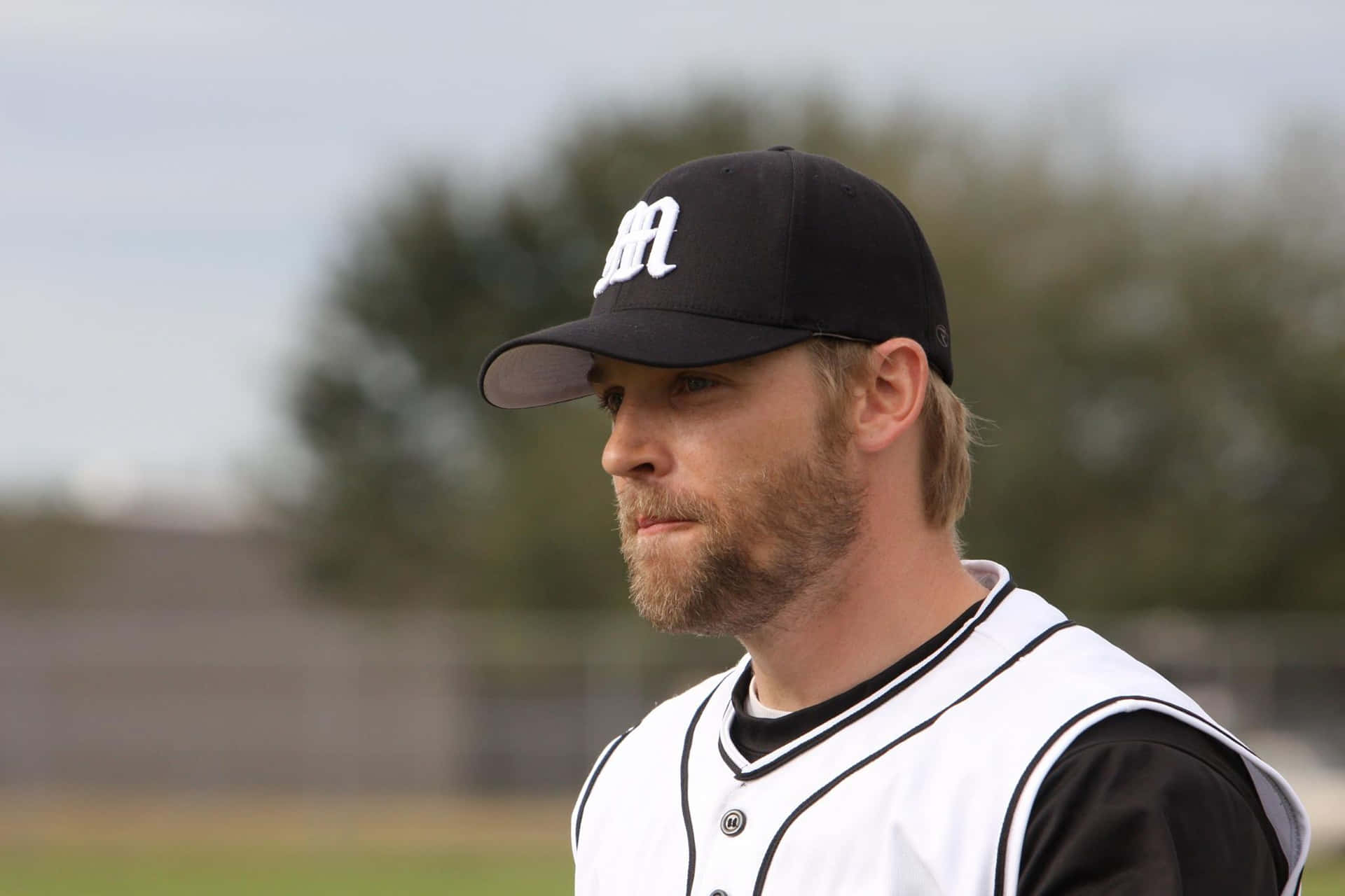 Bearded Man In A Baseball Cap Background
