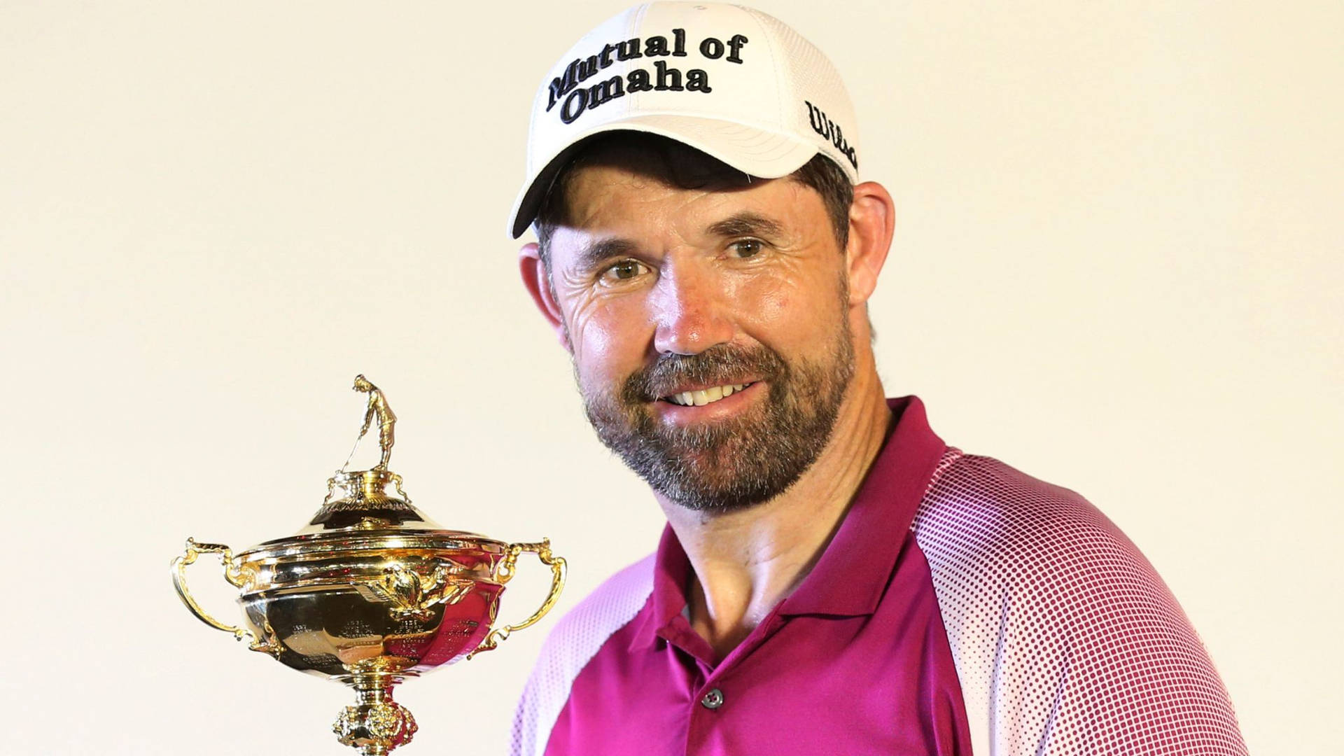 Bearded Padraig Harrington With Trophy Background